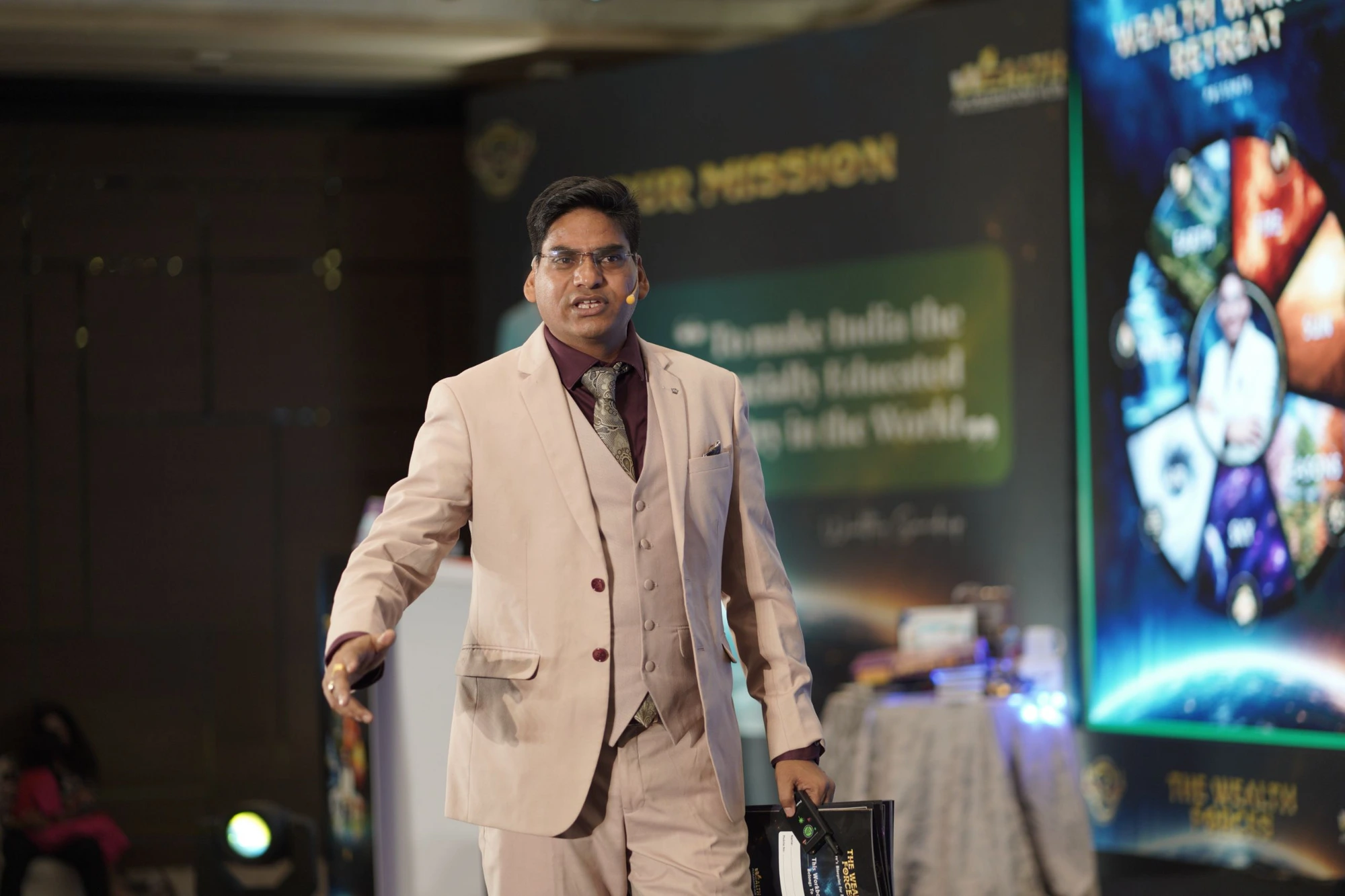Sandeep Gupta speaking on stage